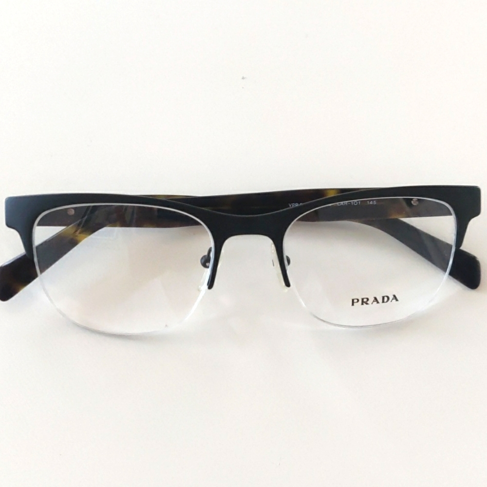 Prada 54RV Glasses. Matte Brown Havana. 51-19-145